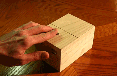 A machine whose only function is to reach out and switch itself off.